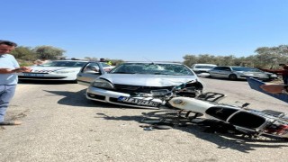 Otomobille çarpışan motosiklet sürücüsü yaralandı