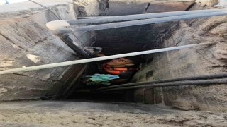 Apartman boşluğuna düşen kedi zorlu operasyonla kurtarıldı