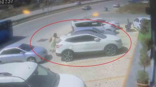 Park halinde hareket eden aracı tek eliyle durduran kadın faciayı önledi