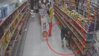 Yaptığıyla şaşırtan hırsız, 100 TLlik enerji içeceği ve bisküvi çaldı: O anlar kamerada