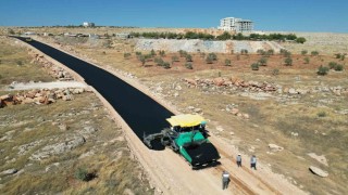 Halfeti Bozova grup yolunda asfalt serimine başlandı