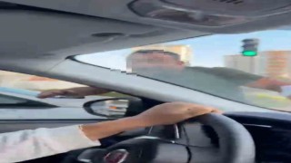 Trafikte tartıştığı kadınların otomobilini yumrukladı