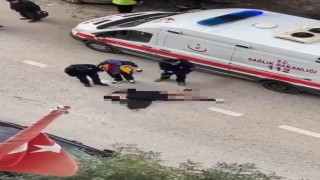 Yolun ortasında yatan kadın, sinir krizi geçirdi