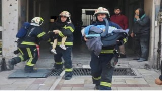 Ev olarak kullanılan iş hanında çıkan yangında 17si çocuk 21 kişi kurtarıldı