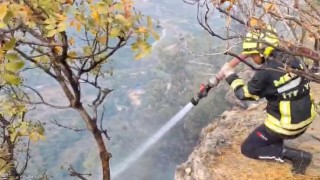 Makilikte çıkan yangın bahçelere ulaşmadan söndürüldü