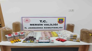 Mersinde kaçak tütün ve 65 adet sigara sarma makinesi ele geçirildi