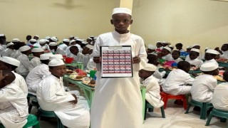 UKABDERden şehitler için anlamlı anma programı: Çadda yetimlere yemek ikram edildi, dualar edildi