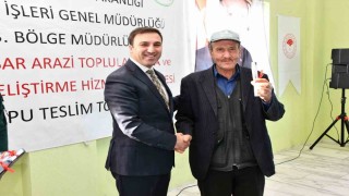 Çavdarhisarda Arazi Toplulaştırma projesi kapsamında tapu teslim töreni düzenlendi