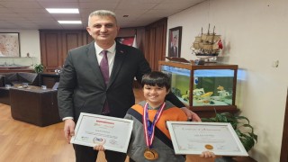 İlkokul öğrencisi, matematik olimpiyatlarında 3 altın madalya kazandı