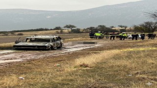 Ispartada dağlık alanda yanmış aracın kenarında başsız erkek cesedi bulundu