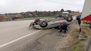 Takla atan otomobilden yara almadan kurtuldu