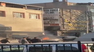 Yeni aldığı otomobilinden alevler yükseldi, yangını söndürdü