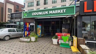 Bursada para üstü kavgası kamerada: Market savaş alanına döndü
