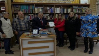 Erzurumun tarih hafızasına vefa: Prof. Dr. Erol Kürkçüoğluna plaket verdiler