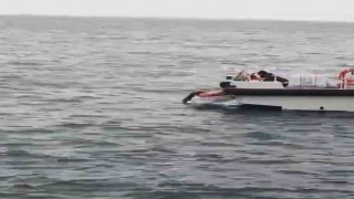 Bartında kıyafetleriyle denize giren kadını sahil güvenlik ekipleri kurtardı