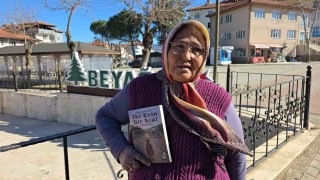 Başkan Pütünden kitap yazan eşine anlamlı sürpriz