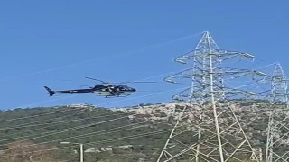 Bodrumda yüksek gerilim hatları helikopterle temizlendi