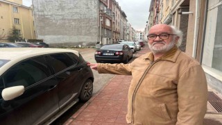 Engelli eşi için evlerinin önündeki sokakta engelli park yeri istiyor