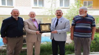 Başkan Sunardan çevre duyarlılığına Örnek Site plaketi