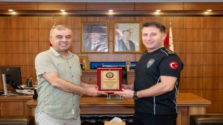 Bilecikte emekli olan polis memuru Tanere plaket takdim edildi