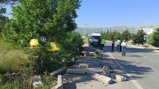 Takla atan otomobilden sürücü yaralı kurtuldu