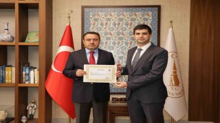 Vali Işından Kaymakam Teltike başarı belgesi