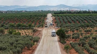 Karacasuda 20 kilometrelik yolda sathi kaplama çalışmaları başladı