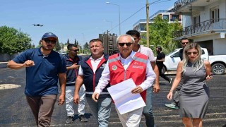 Altınovada 4 mahalleyi birbirine bağlayan caddeye sıcak asfalt