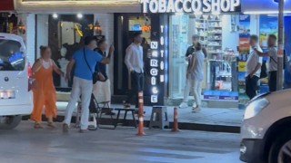 Caddede Kafanı keserim diyerek tehdit etti