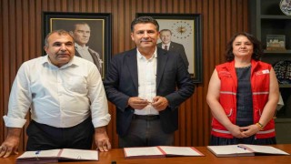 Kozanda 500 öğrenciye kırtasiye ve okul kıyafeti desteği