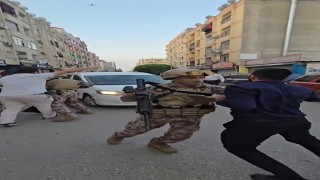 Kuytul çiftine gözaltıyı engellemek için polis aracının önüne yatmaya çalıştılar