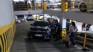 Otoparkta otomobilin altında kalan genç kadın yaralandı