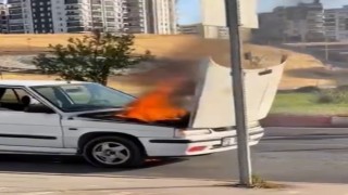 Siirtte seyir halindeki otomobil alev aldı, yangını belediye otobüs şoförü söndürdü